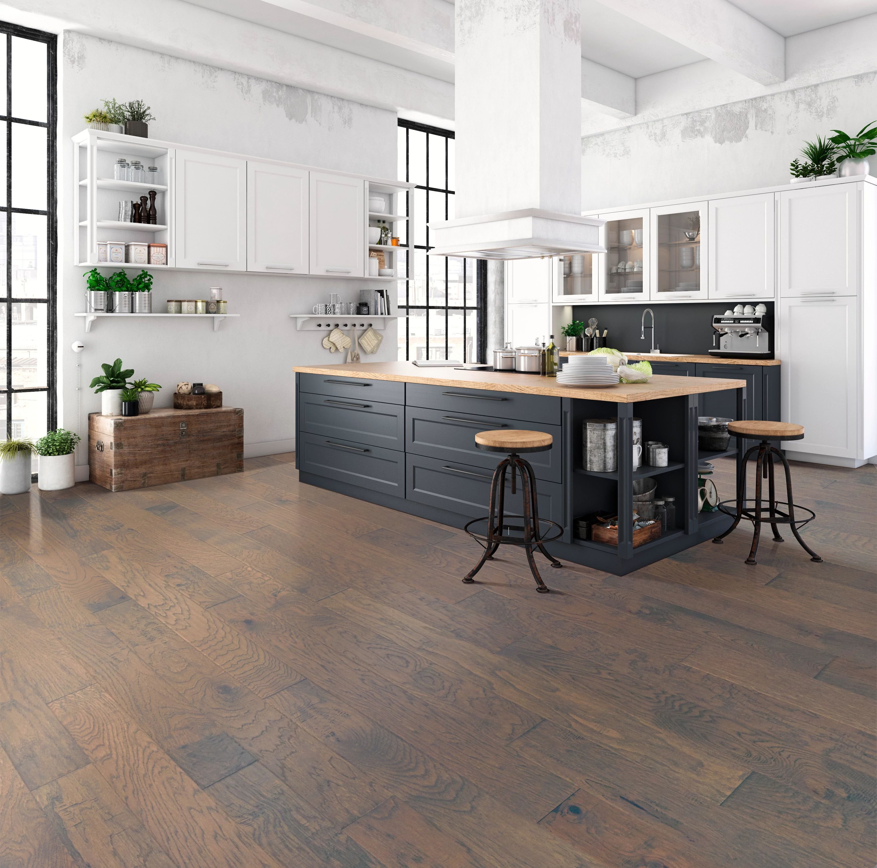 Kitchen with matte black cabinets and medium toned hardwood flooring from Wilmington Carpets in the Wilmington, OH area