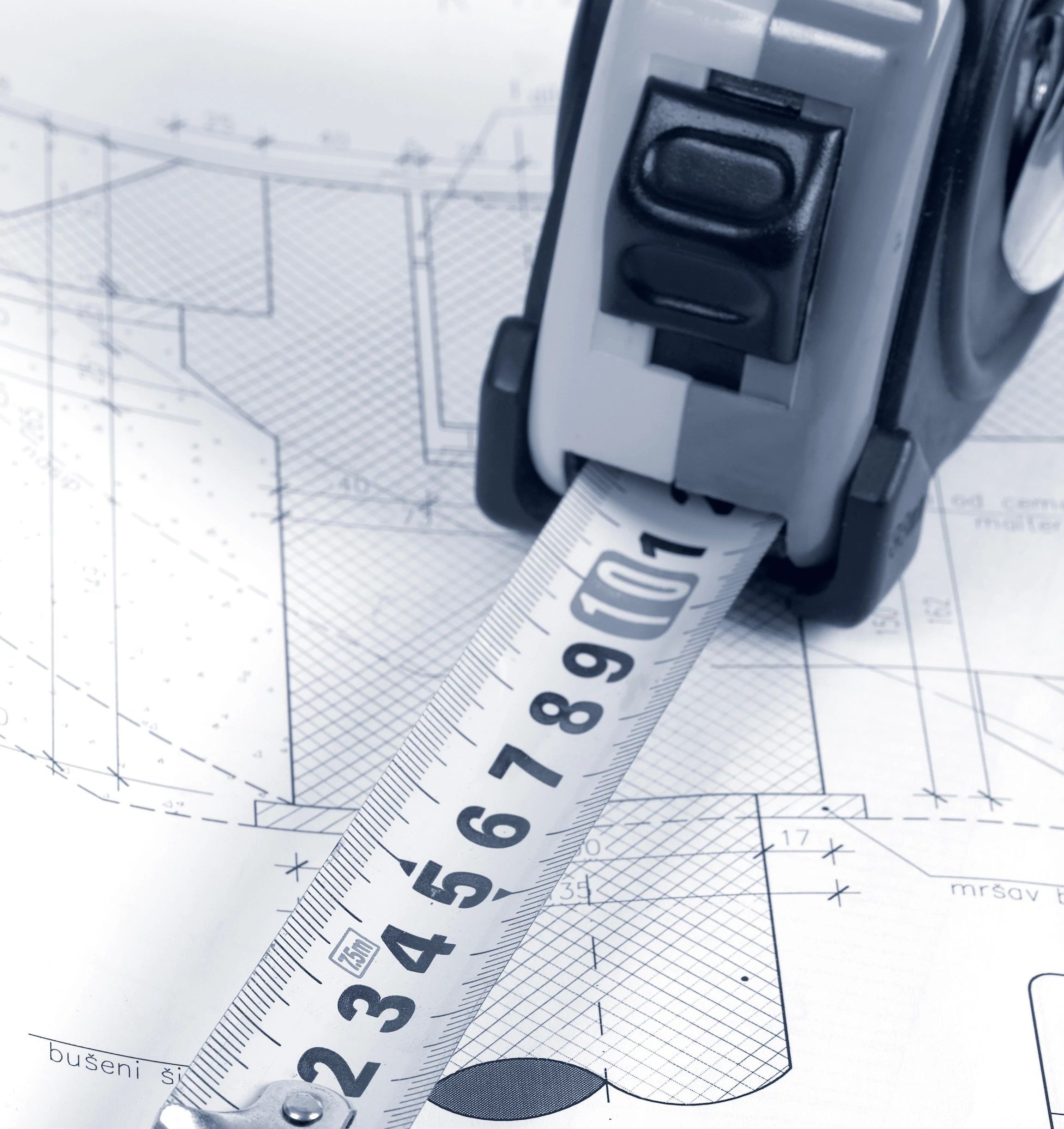 tape measure upon home design blueprints - Wilmington Carpets in the Wilmington, OH area